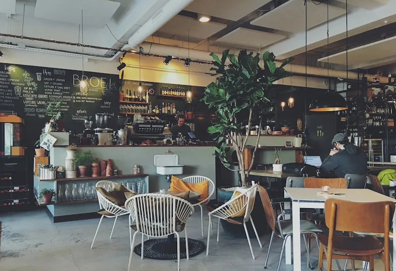 Barista preparing coffee with care at Harbor Coffee